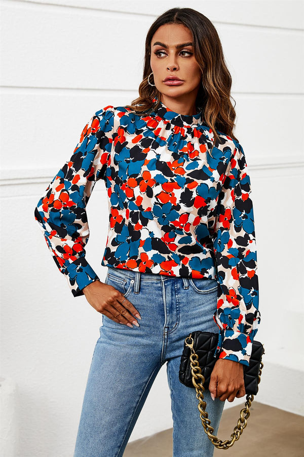 Top met lange mouwen en hoge hals en bloemenprint in blauw 