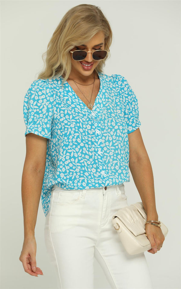 Blousetop met korte mouwen en knopen in blauw-witte bloemenprint